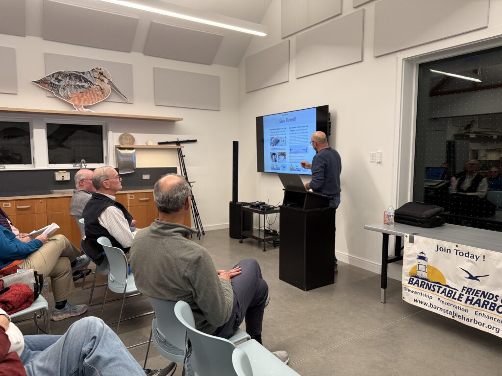 Owen Nichols in front of Friends of Barnstable Harbor members at the 2024 Annual Meeting